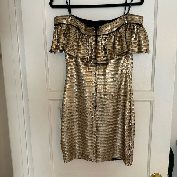 Ruffled Sequined Off-The-Shoulder Minidress
Tadashi Shoji - Picture 6 of 6